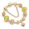 Gouden bijenarmband met gele facetkralen en strikaccenten aan een slangenketting - Stijl 07-Goud/Lichtgeel