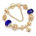 Gouden slangenarmband met blauwe glazen kralen en een fonkelende bijen hanger sieraad - Stijl 05-Goud/Blauw