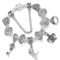 Silver charm bracelet with crown, key, and Best Mom heart pendant on snake chain - Black / 16cm