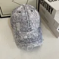 Cappellino da baseball vintage in denim lavato con motivo a fiocco di neve blu e strappi - M / Blu