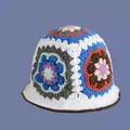 Close-up of handmade crochet bucket hat with colorful floral granny square patterns - M (56-58cm) / Coffee Blue Daisy Hat