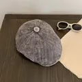 Top view of grey corduroy newsboy cap on wood table with sunglasses and fabric - M (56-58cm) / Gray