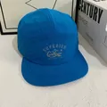 Breathable blue 5-panel camper hat with laser-cut holes and quick-dry mesh fabric - M (56-58cm) / Lake Blue