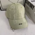 Distressed light green cotton baseball cap with iron rings and Courage embroidery - M (56-58cm) / Light Green