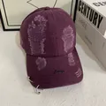 Detail of dark purple cotton baseball cap with ripped effects, metal rings and Courage embroidery - M (56-58cm) / Purple