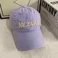 Close-up of distressed lavender baseball cap with embroidered lettering on twill fabric - M (56-58cm) / Purple