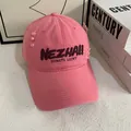 Close-up of pink baseball cap with purple embroidery and distressed ripped details - M (56-58cm) / Hot Pink