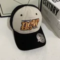 Detalle de gorra de béisbol vintage con bordado de alta calidad y colores contrastados - M (56-58cm) / Negro/Beige