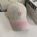 Detailed close-up of pink 3D letter D embroidery on vintage beige washed canvas baseball cap - M (56-58cm) / Beige