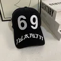 Close-up of black baseball cap with white 69 3D embroidery and side lettering - M (56-58cm) / Black