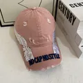 Casquette de baseball rose vintage avec broderie d'ailes et détails de déchirure - M (56-58cm) / Rose