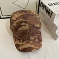 Detail of five-panel camo cap in brown earth tones with durable ripstop texture - M(56-58cm) / Khaki Camo