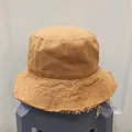 Detail of frayed edge on a yellow mustard canvas bucket hat with vintage fringe trim - M (56-58cm) / Khaki