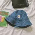 Blue denim bucket hat with daisy embroidery and a minimalist street style design - M (56-58cm) / Medium Denim