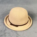 Detail shot of beige woven sun hat with fine straw texture and brown bow decoration - M(56-58cm) / Beige