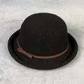 Detail of black knit bowler hat featuring a brown leather band and small side bow accent - M(56-58cm) / Black