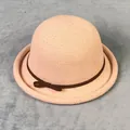 Dettaglio cappello cloche rosa in maglia con tesa arrotolata e fiocco marrone fine - M(56-58cm) / Rosa Antico