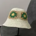 Detail of hand-crocheted sun flower pattern on a beige summer bucket sun hat - M(56-58cm) / White