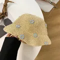 Breathable beige straw bucket hat with delicate blue floral accents for summer beach vacation - M (56-58cm) / Beige