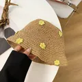 Detail of hand-woven straw bucket hat with delicate yellow and green crochet flowers - M (56-58cm) / Khaki with Yellow Daisies