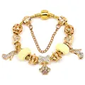 Golden charm bracelet with crown, high heel pendants and sparkling crystals on snake chain - Gold High Heels Cute Pet Paw Print Model 008