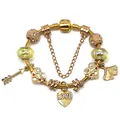 Fashion charm bracelet in gold finish with heart pendants and green glass beads - Gold Heart & Ginkgo Leaf Design (Model 004) / 16cm
