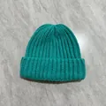 Detail shot of the thick ribbed knit texture and lake green fabric of this winter beanie - M (56-58cm) / Lake Blue
