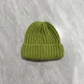 Close-up of grass green knit beanie showing thick ribbed texture and wide folded cuff - M (56-58cm) / Grass Green