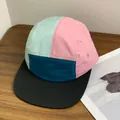 Retro 5-panel camper hat with multi-color blocks and black flat brim for outdoor sports - M (56-58cm) / Cyan+Pink