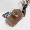 Vintage brown distressed baseball cap with zero embroidery and worn detail on white background - M (56-58cm) / Coffee