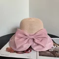 Summer straw sun hat with large pink organza bow and wide brim for beach vacation wear - M (56-58cm) / Pink