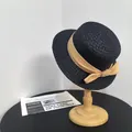 Navy blue flat top woven straw sun hat with large khaki ribbon bow for beach vacations - M (56-58cm) / Black