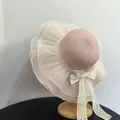Elegant pink straw sun hat with white organza wavy brim and lace bow for summer beach travel - M (56-58cm) / Pink