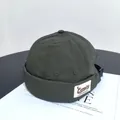 Detail of dark green docker hat with Camping patch and adjustable buckle on back - M(56-58cm) / Army Green