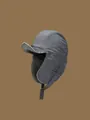 Dettaglio del tessuto antivento e fodera in ecopelliccia sul cappello invernale grigio - M(56-58cm) / Grigio