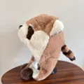 Detail of plush animal winter hat featuring soft faux fur and a striped raccoon tail - M (56-58cm) / Khaki
