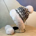 Winter knitted earflap hat with geometric patterns and faux fur trim and pom-poms - M (56-58cm) / Gray