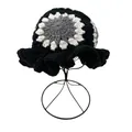 Handcrafted knit bucket hat with ruffled brim and floral pattern in black and white - M / Black