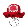 Detail of handmade crochet bucket hat with floral pattern and ruffled edges in red and white - M / Red