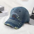 Gorra de béisbol de mezclilla desgastada con bordado M y texto Minnesota azul claro - M / Azul Vintage