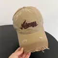 Detailed close-up of distressed khaki baseball cap with 3D Always embroidery and frayed edges - M (56-58cm) / Khaki