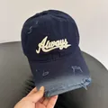 Close-up of distressed navy blue baseball cap with white 3D embroidered Always text - M (56-58cm) / Navy Blue