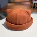 Close-up of caramel corduroy cat ear beanie with soft texture and rolled brim detail - M (56-58cm) / Caramel color