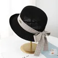 Women's black straw sun hat with plaid bow ribbon and elegant metal logo on a stand - M (56-58cm) / Black