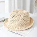 Detailed macro view of the breathable hollow knit pattern on this beige sun bucket hat - M / Beige