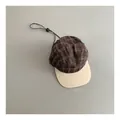 Bovenaanzicht van vintage geruite honkbalpet met contrastkleurige klep en zwart trekkoord - M / Bruin