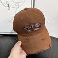 Detail of vintage distressed brown baseball cap with NEWYORK 1989 letter embroidery - M (56-58cm) / Coffee