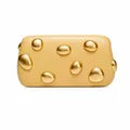 Close-up of warm yellow leather clutch with artistic gold irregular metal hardware - Yellow With Double-Sided Studs