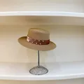 Detail of wheat boater straw hat featuring a brown ribbon with sparkling rhinestones - M (56-58cm) / Khaki