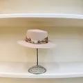 Detail of pink boater hat with floral ribbon and elegant rectangular pearl buckle - M (56-58cm) / Pink